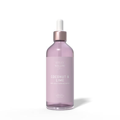 A bottle of Lilly Willow Coconut & Lime face self-tanning water, featuring a translucent lavender-purple bottle, a metallic rose gold collar, and a white dropper cap, set against a clean white background.